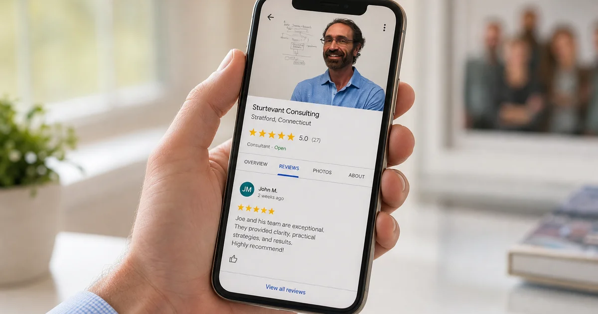 Smartphone showing 5-star Google review on a local business profile