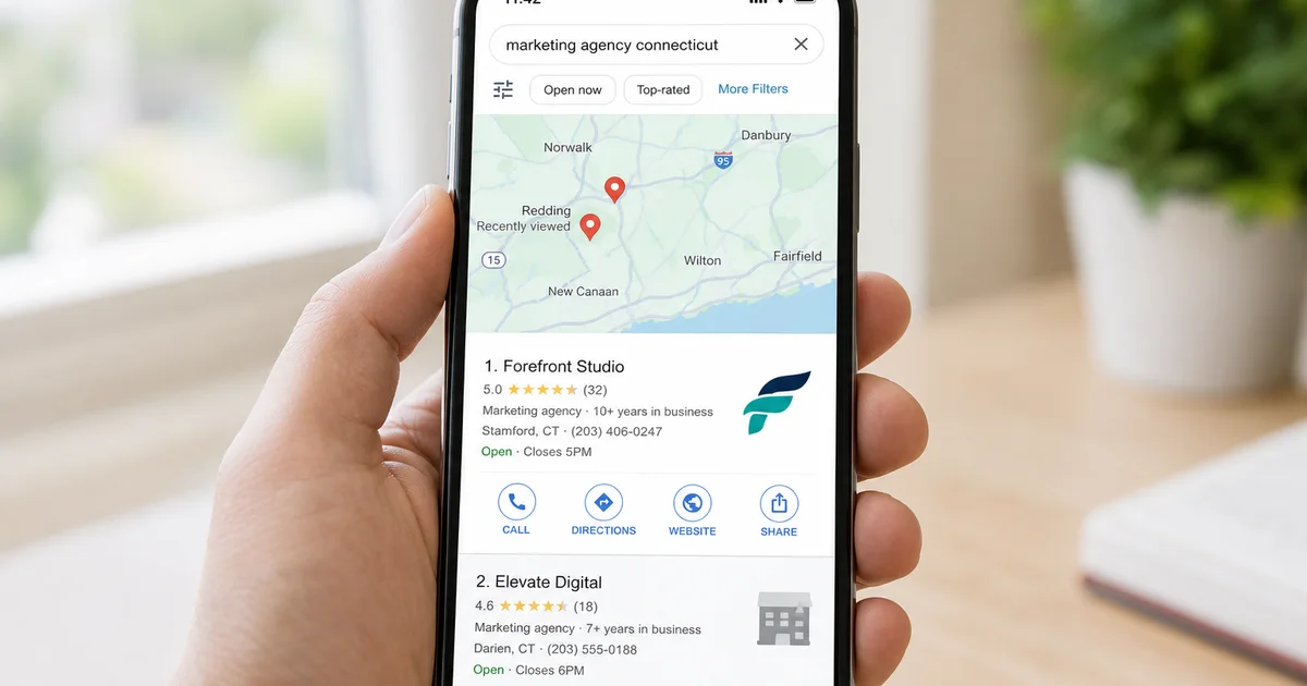Smartphone showing Google Maps with local business listing and ranking